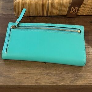GC Kate Spade New York turquoise leather wallet/ clutch with signature bow